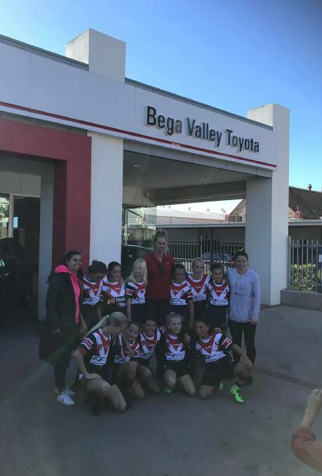 Inspiring youngsters: Kezie Apps with the Bega Roosters under 11s girls at Bega Valley Toyota on Saturday. Picture: Bega Valley Toyota. 