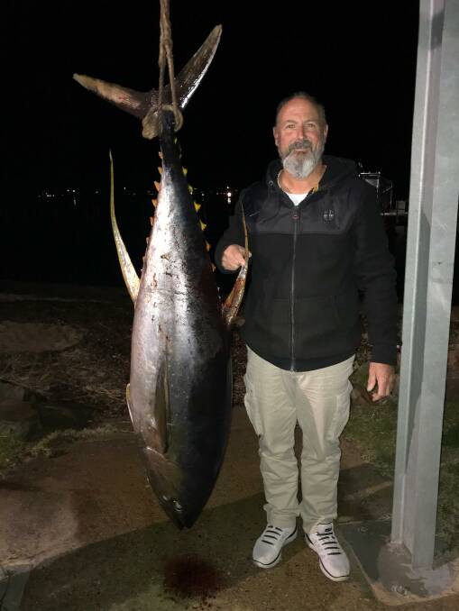 Trevor Chippendale of Eden with his magnificent 63kg Yellowfin Tuna taken on Sunday 13 June during the Merimbula Open Game Fishing Tournament.