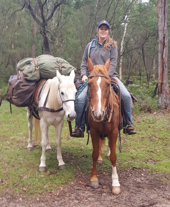 Bella Hart and her packhorse on the ride from Nelligen to Bemboka. Picture: Melissa O'Brien