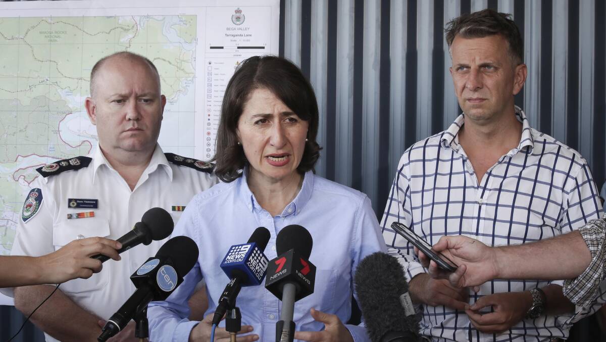 NSW Premier Gladys Berejiklian declares Tathra a disaster recovery scene in March 2018. Residents are still no closer to answers as to how the fire started. Photo: Alex Ellinghausen