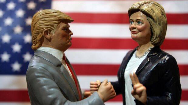 Statuettes depicting the presidential candidates Donald Trump, left, and Hillary Clinton in a shop in Via San Gregorio Armeno, the street of nativity scene craftsmen, in Naples, Italy. Picture: ANSA/AP
