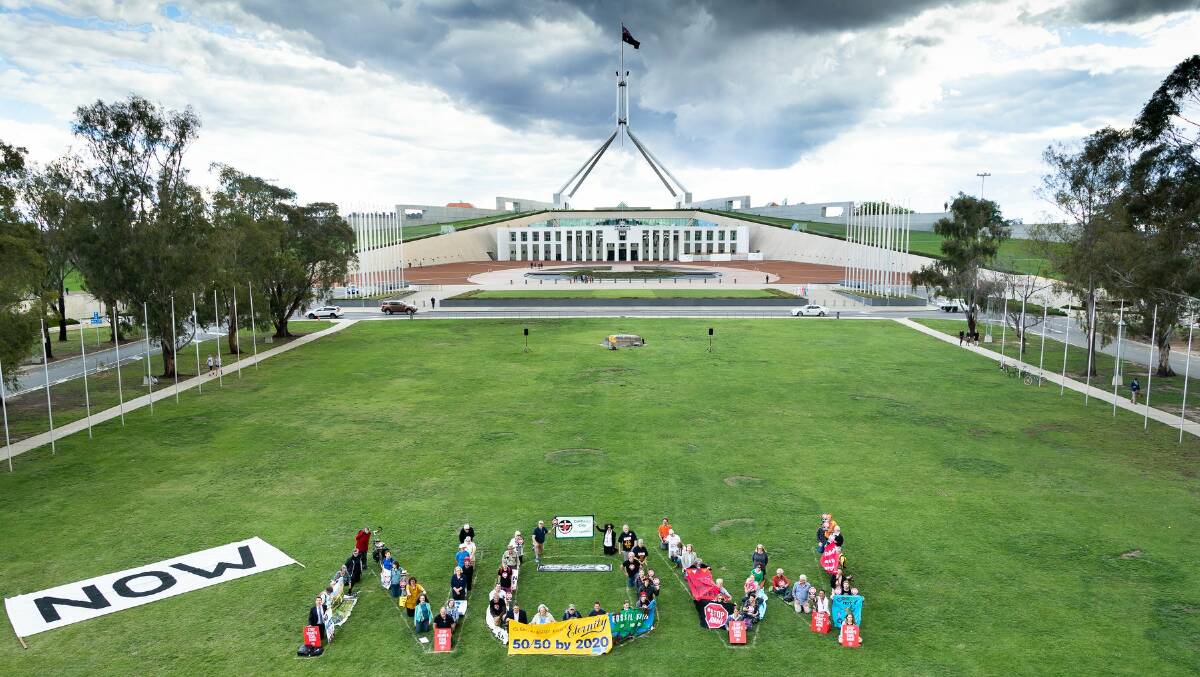 Members of Clean Energy for Eternity lobby for action on climate change outside Parliament House in Canberra last week. Picture: CEFE