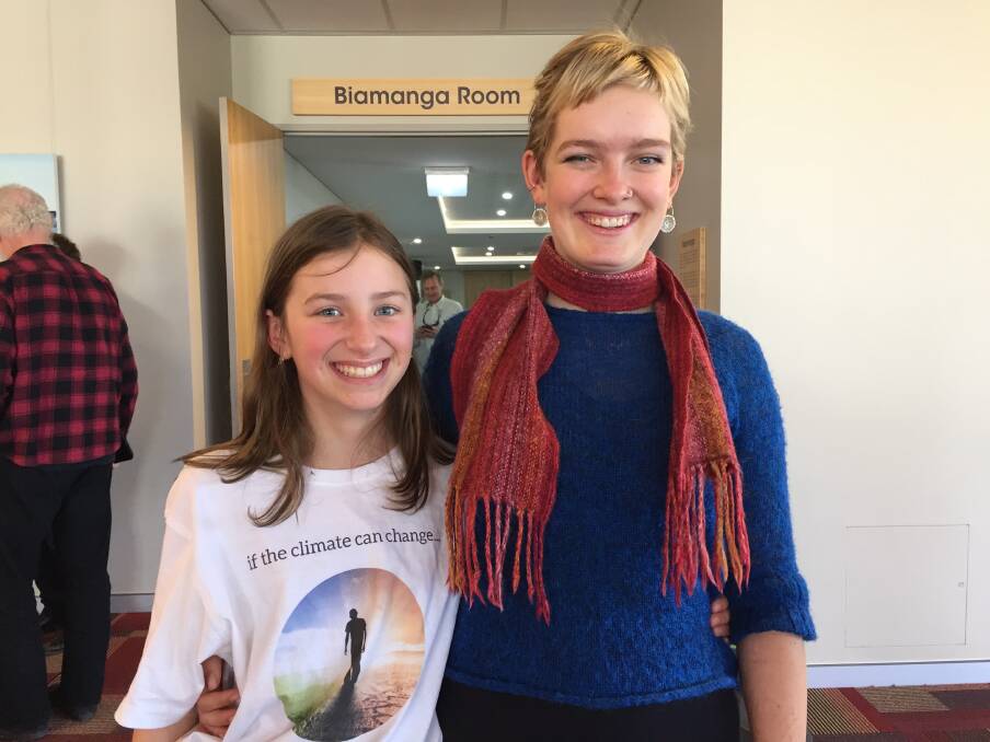 Eleven-year-old Alina North-Andrew and 17-year-old Dominique Turville, who has collected almost 6000 signatures on her climate emergency petition.