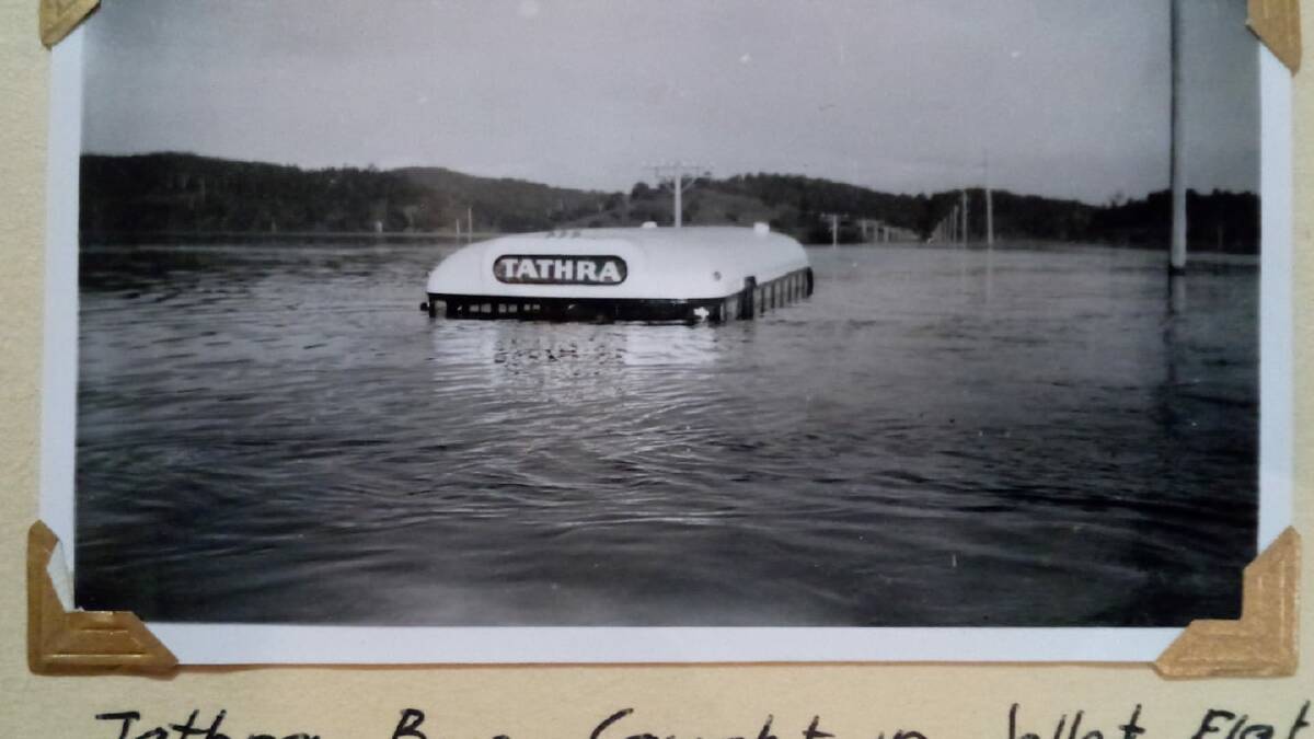 The historic photo of a Tathra bus caught in the Jellat Jellat flood in 1960. Picture courtesy of the late Rex Holgate