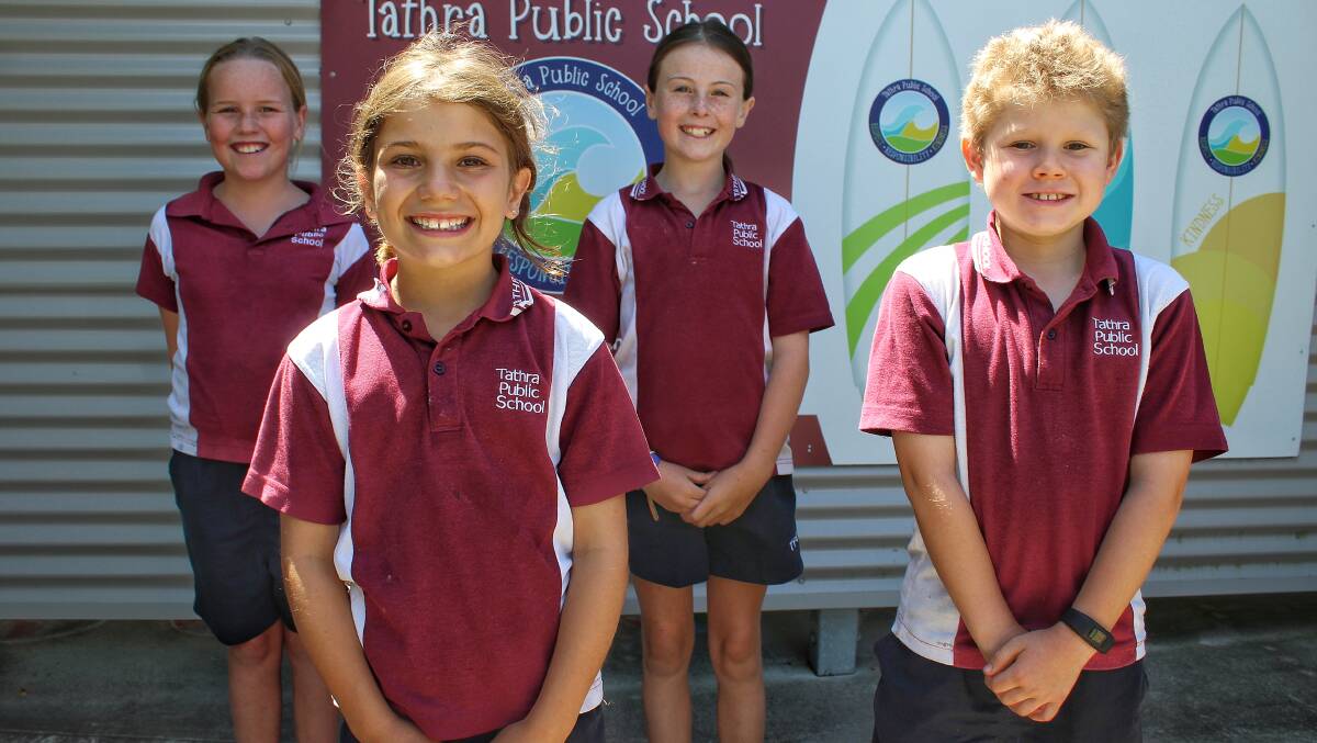 GIVING: Tathra Public School pupils Mali Whatmore, Luca Defina and Liv Barker ahead of the launch of the school's Christmas giving tree on Friday. Picture: Alasdair McDonald