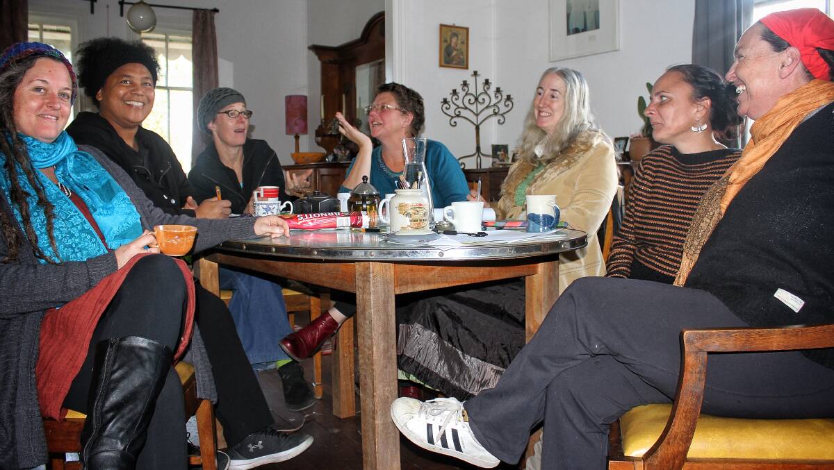 Womoon Tide Feminist Writers members Julie, Gabrielle Journey Jones, Cindy, Fiona McLennan, Jane Thomson, Sassi Meaghan Nuyum-Holt and Cath Turville. Picture: Alasdair McDonald