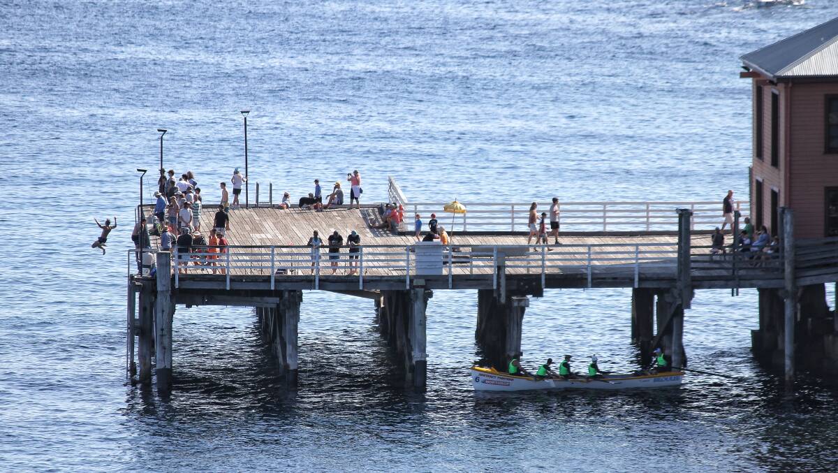 Swimmers, fishers and George Bass rowers enjoy the iconic Tathra Wharf on Friday, January 5.