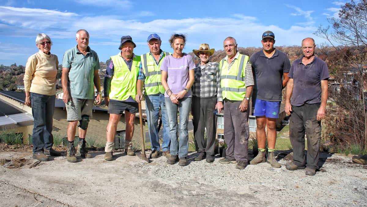 Lions Club of Tathra members and volunteers with Tathra resident Jani Klotz. Picture: Alasdair McDonald