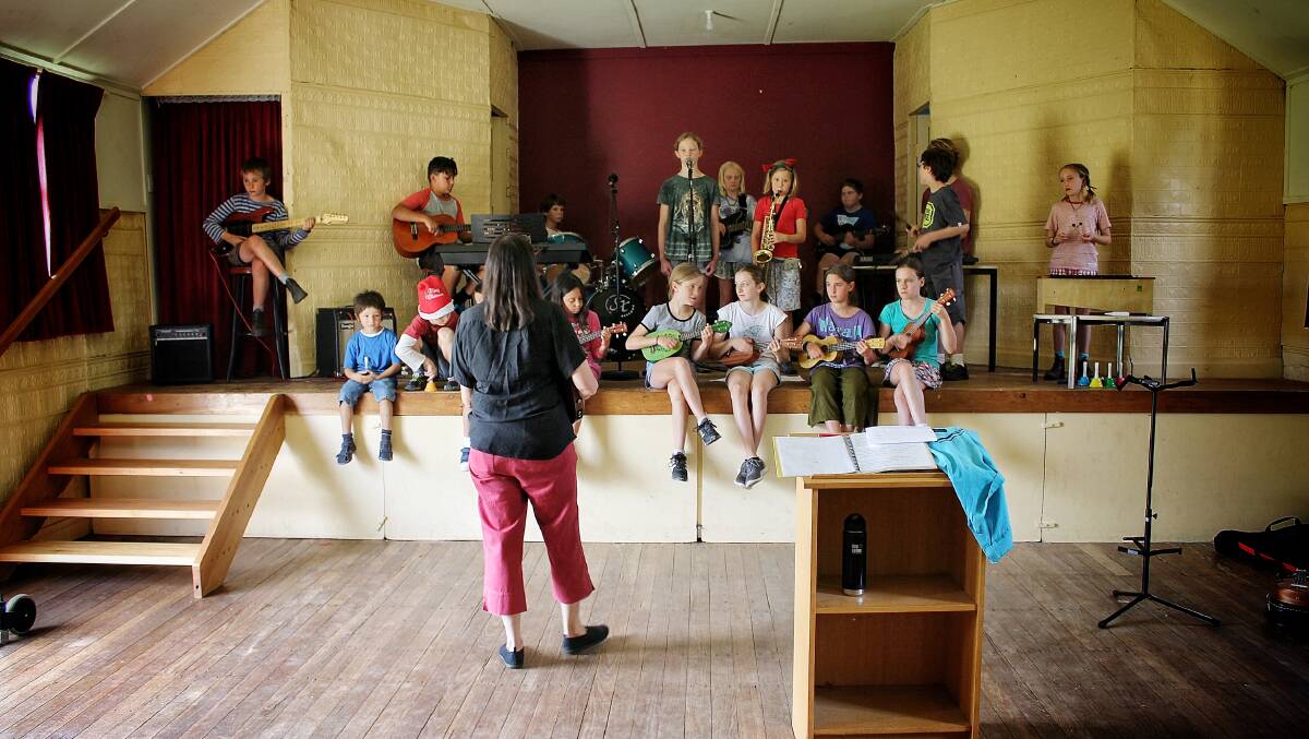 FEE CONCERNS: Tanja Public School pupils rehearsing last year inside the Tanja School of Arts Hall. Picture: Alasdair McDonald