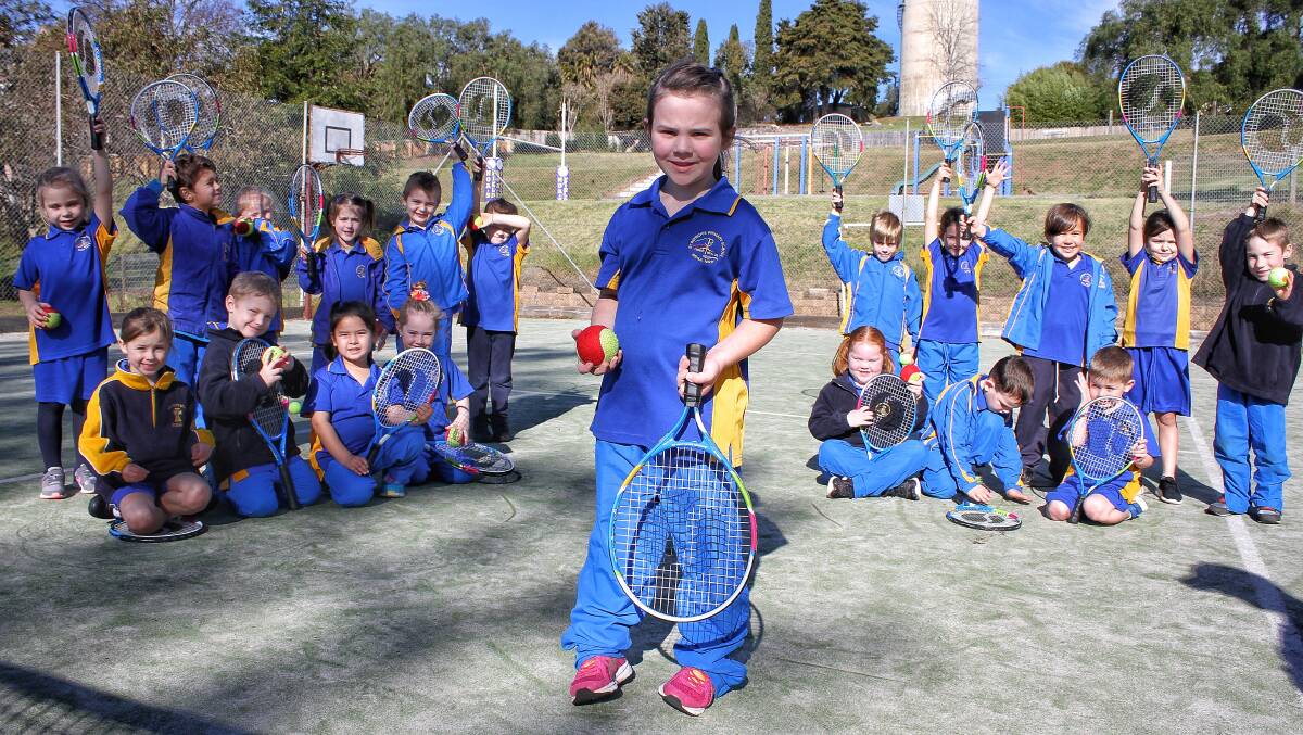SERVED UP: St Patrick's Primary School Kindergarten pupil Eleanor Wiley and her class with their raquets from Tennis Australia. 