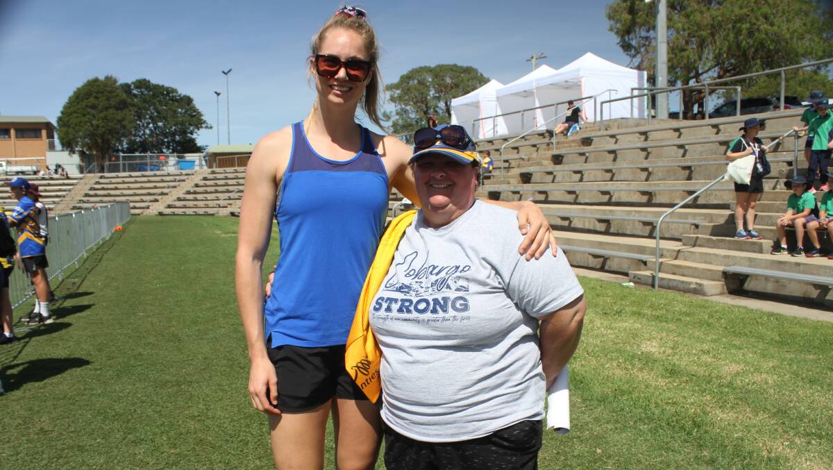 Parramatta fanatic Sharon Cook (right) with St George Illawarra Dragons NRLW player Kezie Apps. Picture: Alasdair McDonald