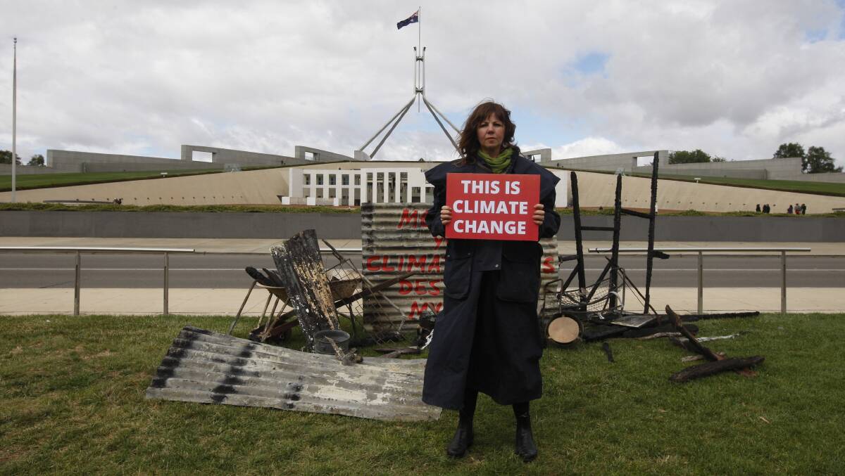 Bushfire Survivors for Climate Action chair Jo Dodds outside Parliament House before the unprecedented Black Summer fires reached the Bega Valley. Picture: Dean Sewell/Greenpeace