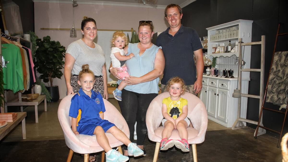 ALL SMILES: Right at Home Staging's Jessica Dwyer with Stephanie and Angus Johnston and their children Annika, Matilda and Alexandra.