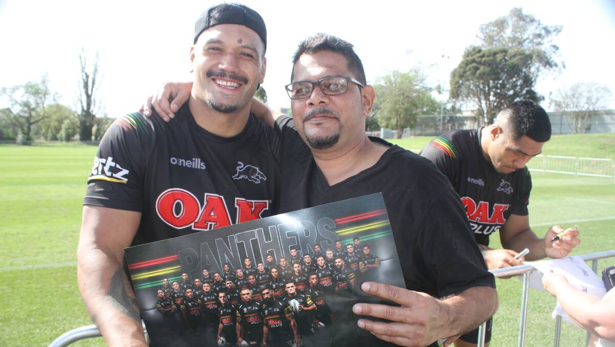 Bega's Chris Aldridge (right) with Penrith Panther Zane Tetevano in Bega on Friday. Picture: Alasdair McDonald