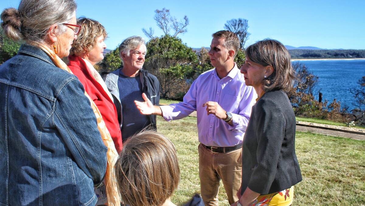 Bega MP Andrew Constance and Premier Gladys Berejiklian chat with walkway campaigners Christine Hamilton and Pip and Michael Marshman.