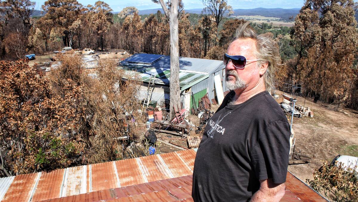 DISBELIEF: Vimy Ridge Road resident Allan Noble suffered burnt corneas as he fought to save his family home with his wife Kim as fire destroyed his property. Picture: Alasdair McDonald