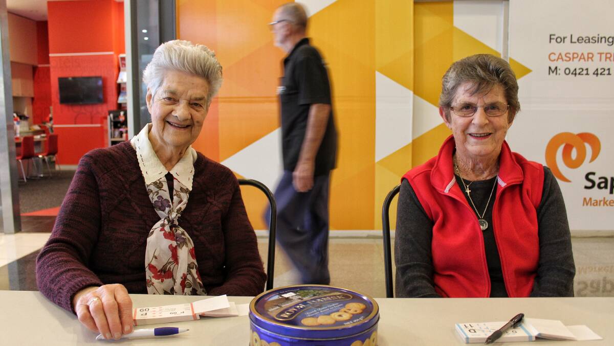 SPRING FETE: Daphne Sweeney and Kelva Johnson will be selling raffle tickets for the fete inside Sapphire Marketplace until Friday at 2pm.