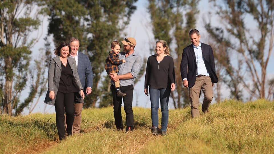 Dan Tarasenko and Lyndal Guthrie with their two-year-old son Leo during a visit to their farm by Labor leader Anthony Albanese, Labor's treasury spokesperson Jim Chalmers and Labor candidate for Eden-Monaro Kristy McBain. Picture: Supplied