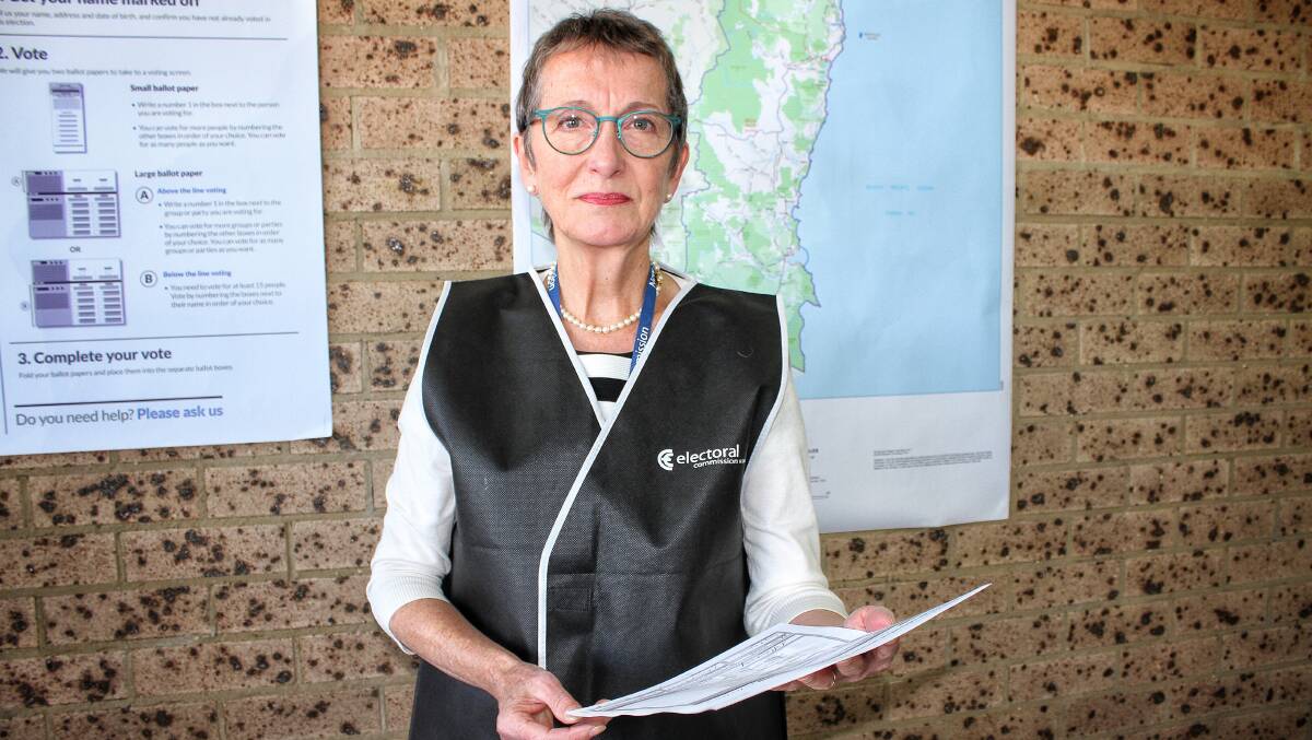 DRAWN: The NSW Electoral Commission's election manager for Bega Susan Flannery holds the paper containing the order of the March 23 2019 state election paber paper on Thursday. Picture: Alasdair McDonald