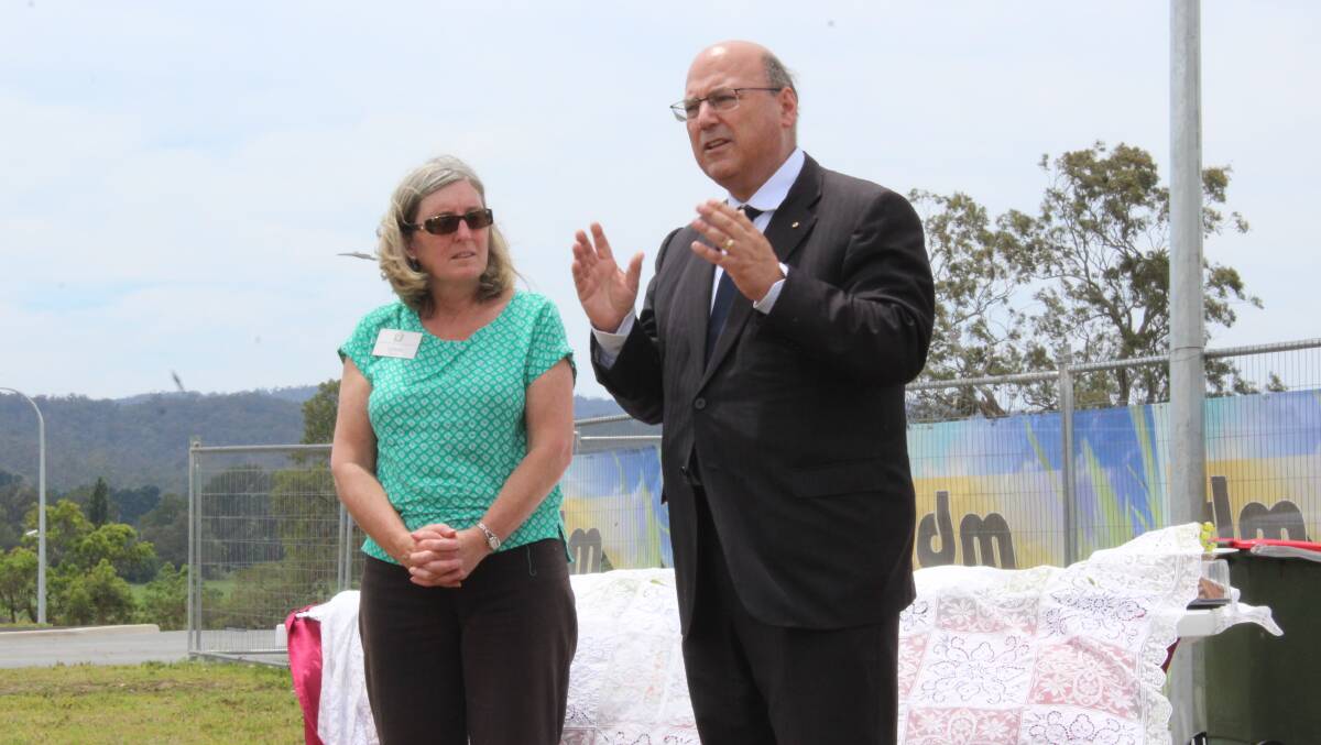 Liberal Party Senator Arthur Sinodinos with Community Carers Accommodation South East president Lynne Koerbin in December last year. Picture: Alasdair McDonald