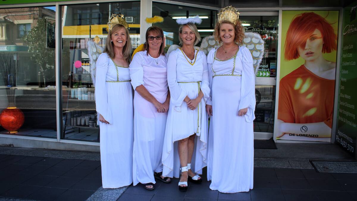 ANGELS: Affinity for Hair's Gail Sargent, Jackie Clothier, Robyn Gill and Megan Filmer have been dressed as angels this month as they raise money for the Charlie Teo Foundation. Picture: Alasdair McDonald