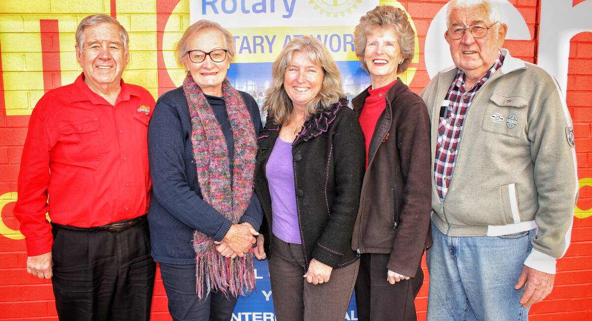 CARING DONATION: Bega Rotary's Lex Marshall, Margaret Taylor, Ruth Marshall and Butch Robinson with Community Carers Accommodation South East's Lynne Koerbin (centre). Picture: Alasdair McDonald