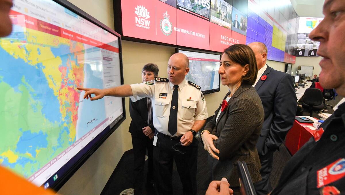 FIRE EMERGENCY: A concerned NSW Premier Gladys Berejiklian with NSW RFS Commissioner Shane Fitzsimmons in the NSW Rural Fire Service control room. Picture: Peter Rae
