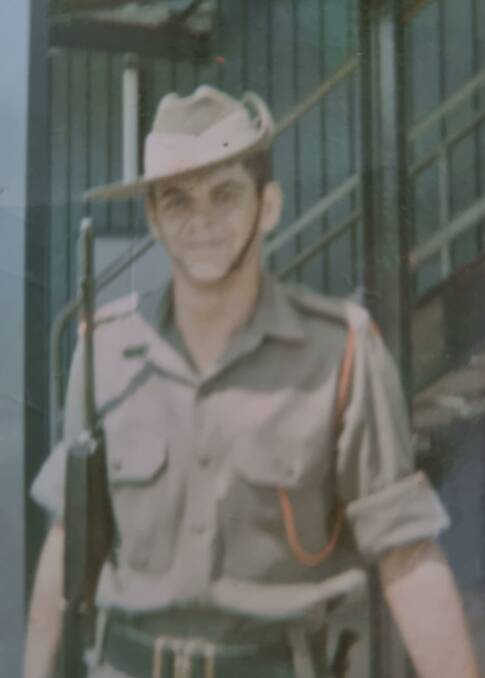 Narooma's Trevor Bennett in his army uniform was wounded in the battle of Nui Le in Vietnam 50 years ago.