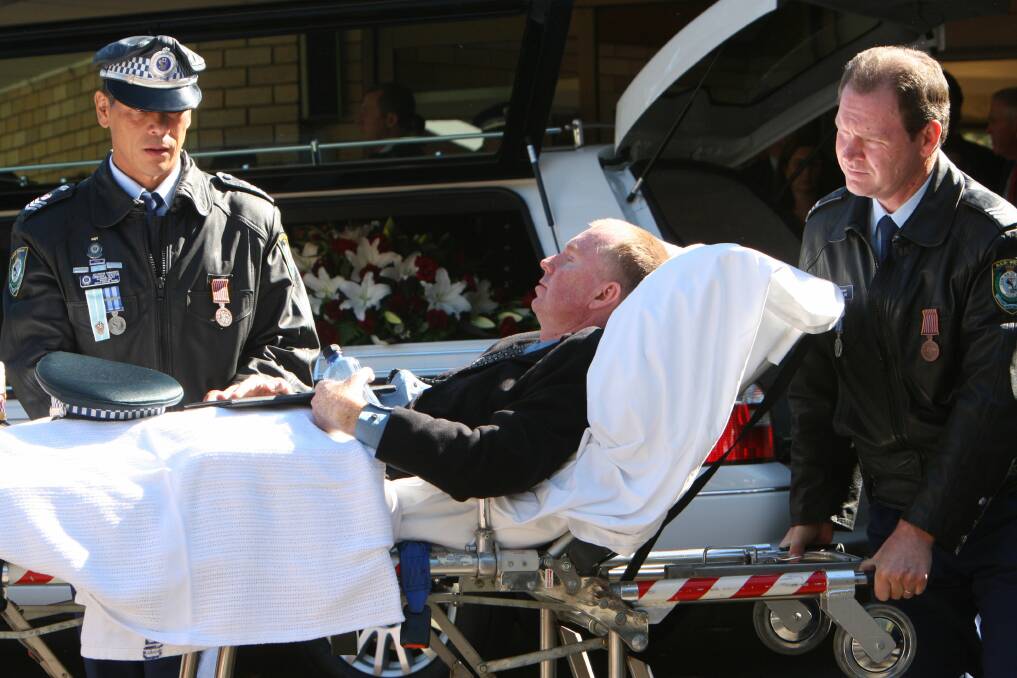 Brett was still seriously injured at his fiance's funeral. 