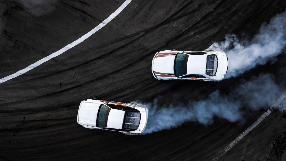 Drifting is judged, not timed, and cars battle in pairs. Photo: Shutterstock