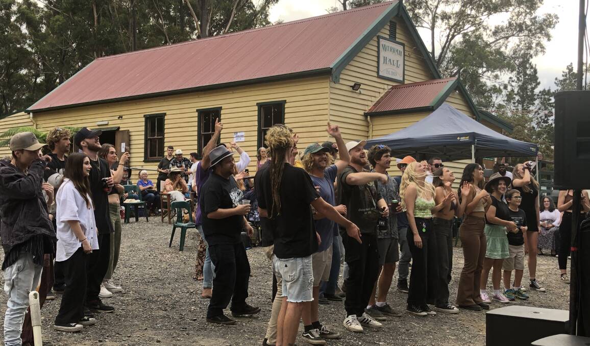 LETTING LOOSE: The crowd show some appreciation for Prodikal-1's performace on the outdoor stage at the Murrah Hall for the REVIVE event organised by Bermagui Seasiders. Photo: Leah Szanto