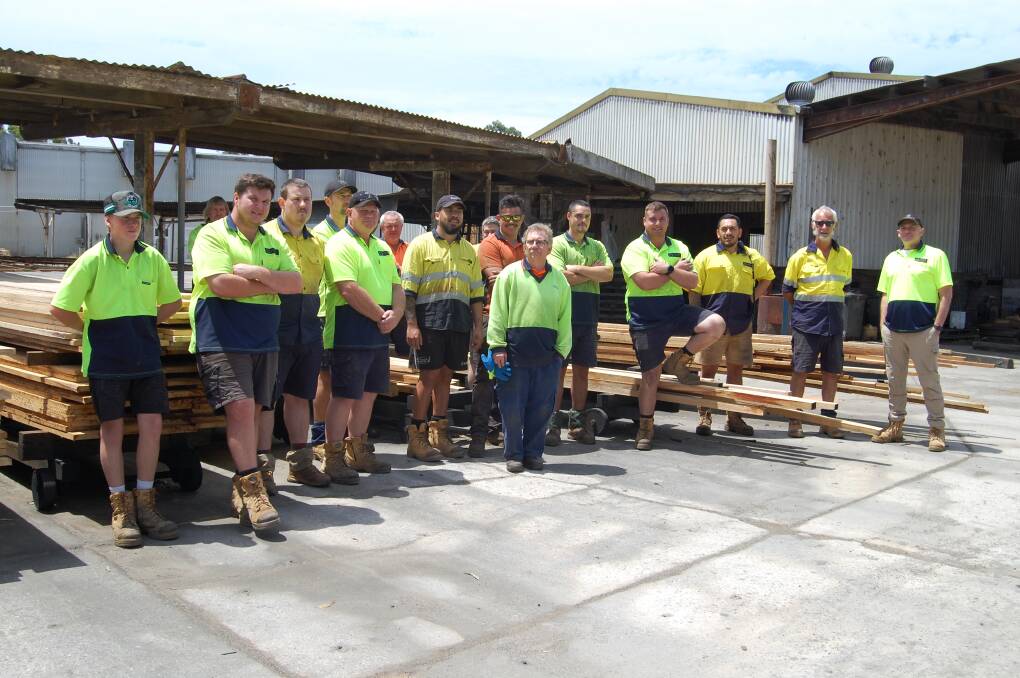 BLESSED WITH A GREAT CREW: Managing director of South Coast Timber Damien Bunting (far right), speaks glowingly about his team of 30 employees. Photo: Leah Szanto