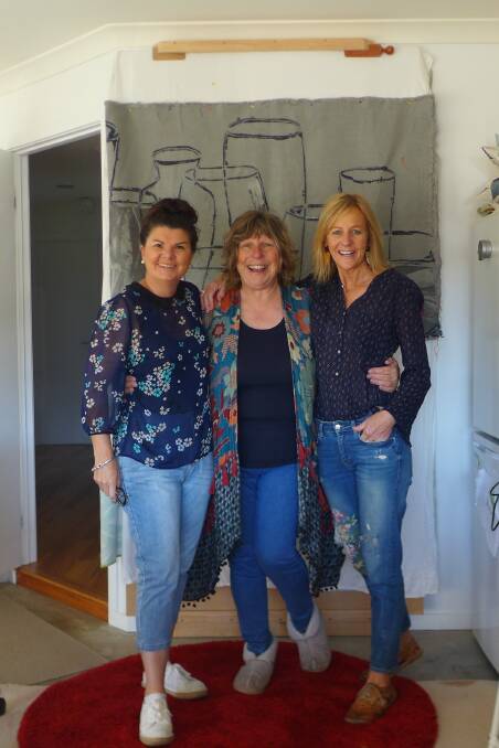 ACT OF KINDNESS: Joanne Pascall, Mirjam Aigner and Janine McDermott created the 120 artworks over roughly a 12-month period, with the vision to gift the pieces to Mallacoota residents who had lost buildings in the Black Summer fires. Photo: supplied.