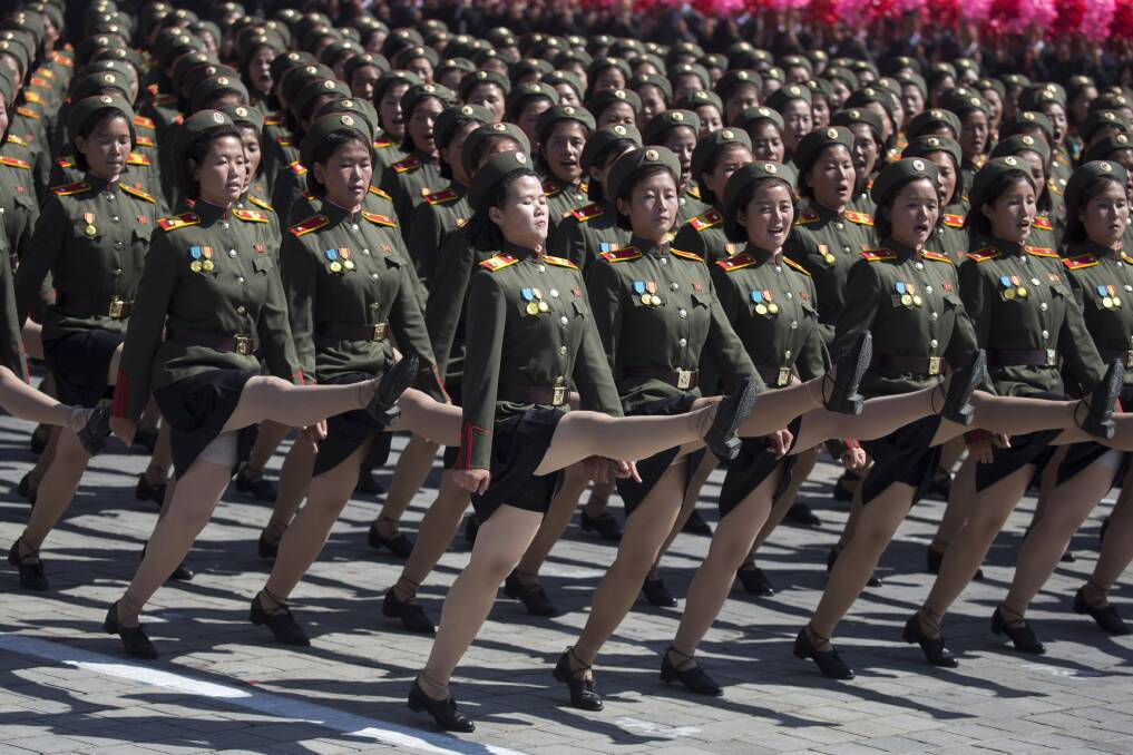 FALL INTO LINE: These North Korean soldiers are very patriotic. And they're showing it perfectly.