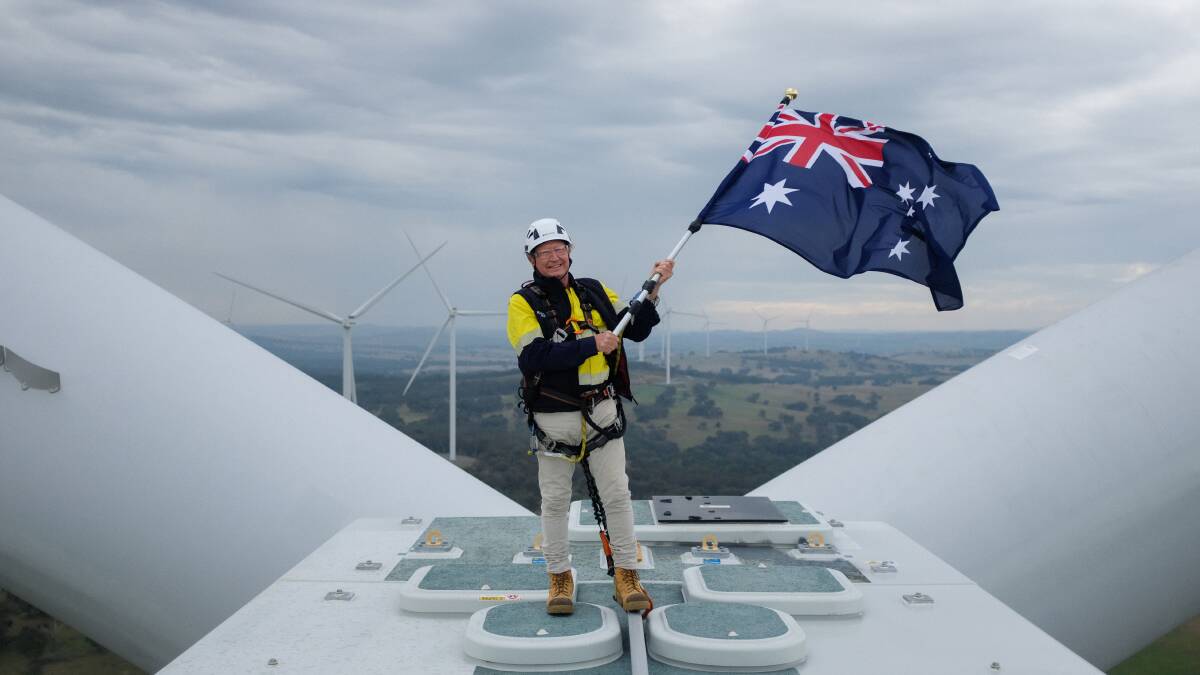 Andrew Forrest climbed on top of a wind turbine for the opening of Bango Wind Farm, which he has called a significant milestone in Australia's transition to green energy. Picture by Karleen Minney