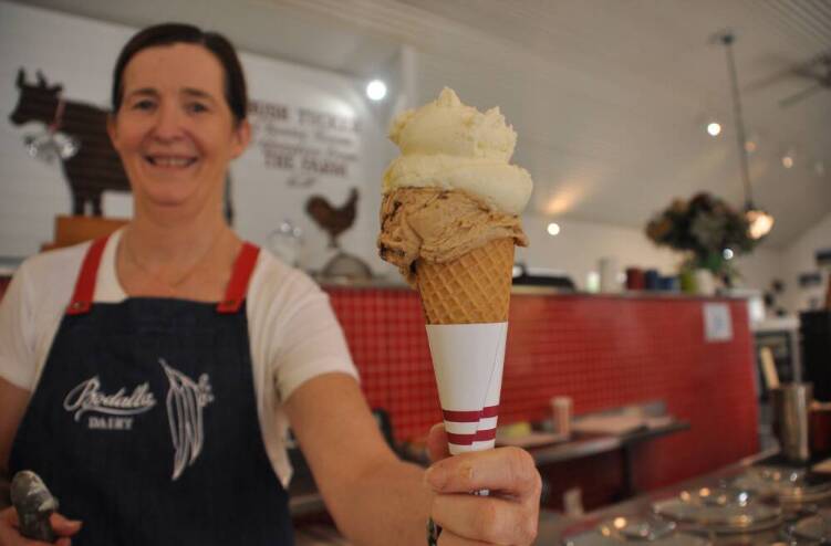 Cathryn Overton at the Bodalla Dairy Shed with the award-winning Kakadu Plum and Rum ice cream with a scoop of vanilla.