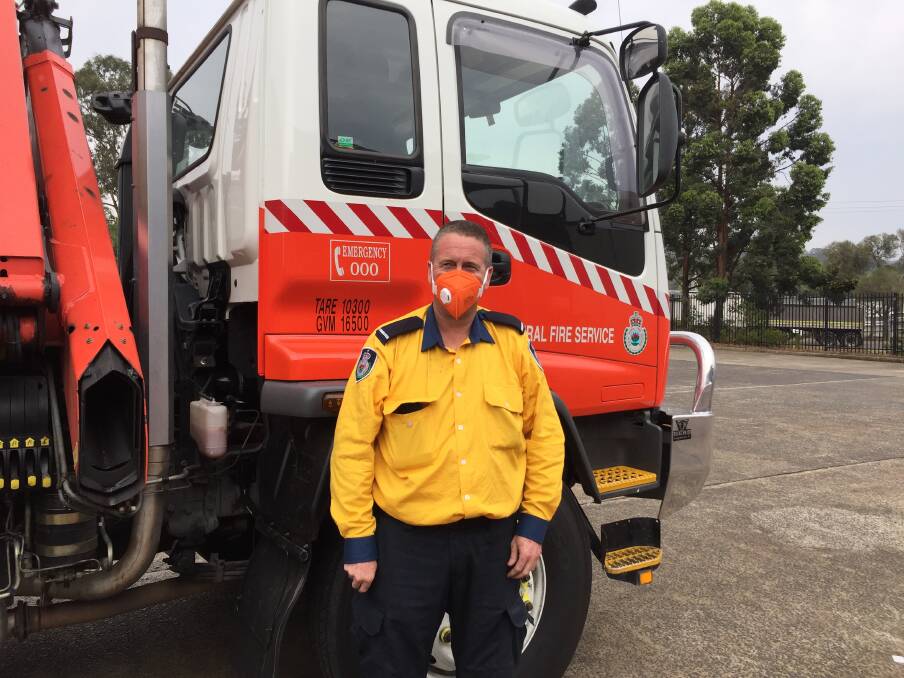 Sweet charity: Albion Park RFS member Kurt Hill travelled to Picton to pick up some of the P2 face masks for his colleagues. Picture: Supplied