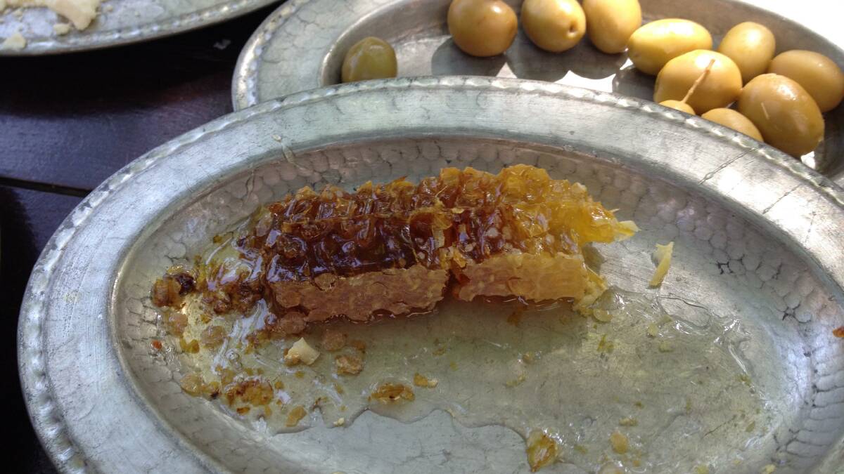Fresh honeycomb and olives for breakfast. Photo: Nicole Phillips