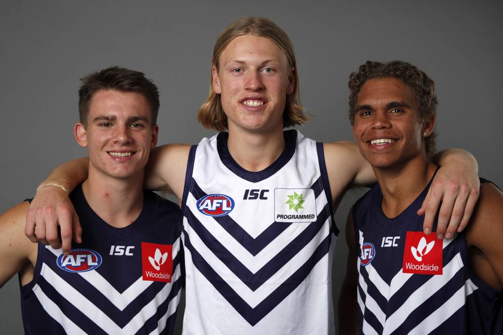 TOP TRIO: Caleb Serong, Hayden Young and Liam Henry made their AFL debuts for Fremantle in 2020. They were all top-10 draftees. Picture: Getty Images 