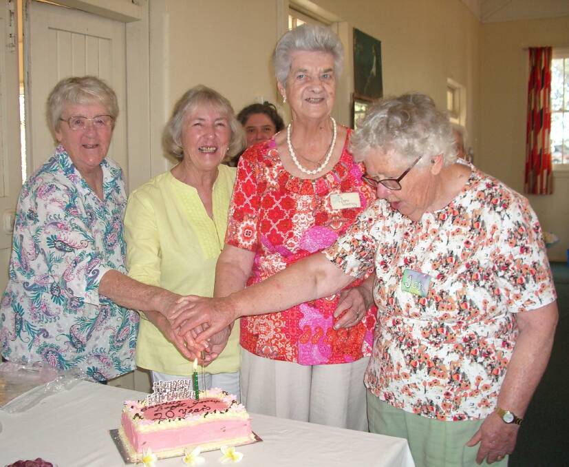 Candelo celebration: Foundation members of the Candelo Craft Group marked the group's 20th birthday with a cake cutting.