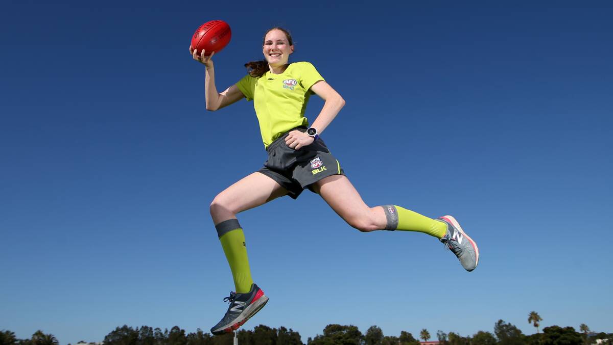 Jumping for joy: Sixteen-year-old Shauna Flynn on Saturday will become the first local umpire to officiate in an AFL game. Picture: Sylvia Liber