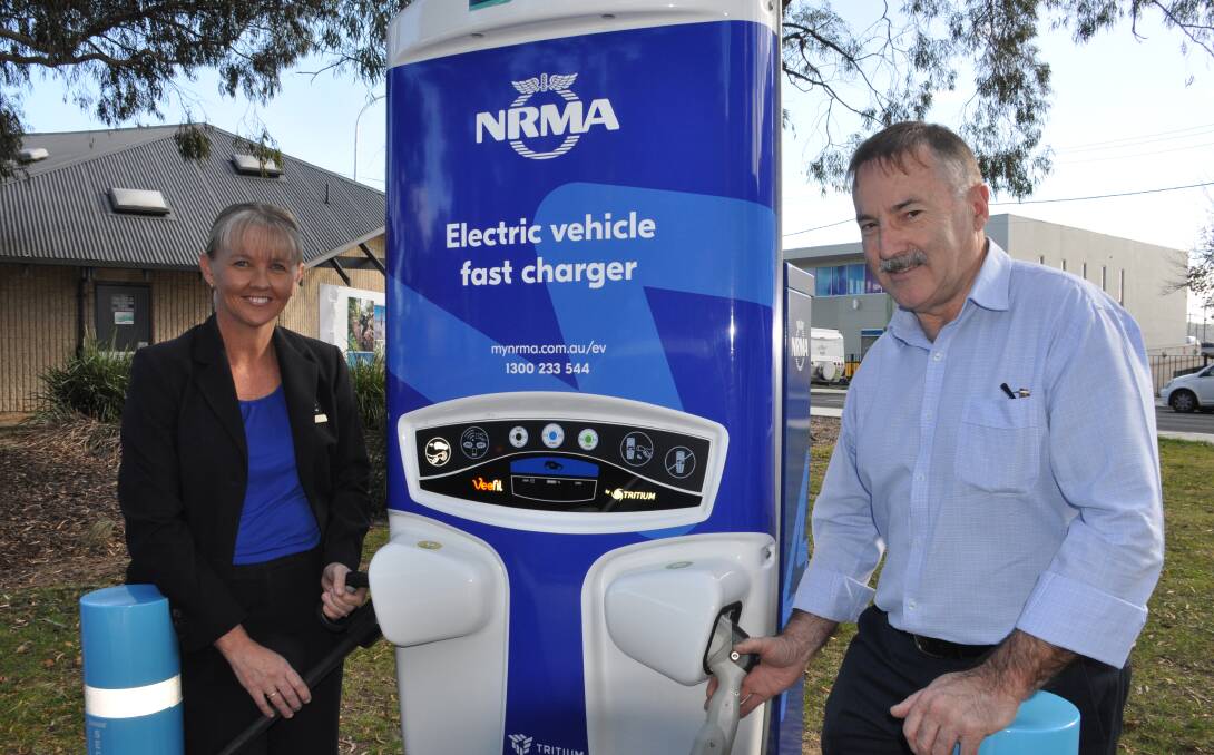 NRMA and Eurobodalla councillors officially open the Batemans Bay EV charging station.