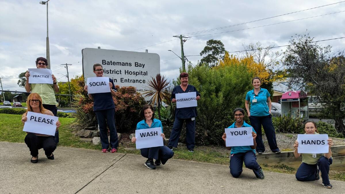Health care staff at Batemans Bay Hospital urge the public to practise social distancing and wash hands. Image: Southern NSW Local Health District