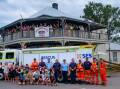 THANK YOU: Port Stephens SES volunteers with members of the Hinton community at the Victoria Inn Hotel on Thursday.