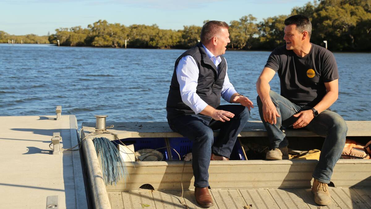 Agricultural minister Dugald Saunders speaking with Lemon Tree Passage oyster farmer Matt Burgoyne about the QX disease outbreak in Port Stephens. Picture: Ellie-Marie Watts