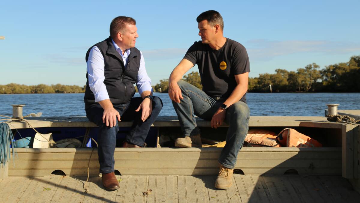 URGENT: Agricultural minister Dugald Saunders speaking with Lemon Tree Passage oyster farmer Matt Burgoyne about the QX outbreak.