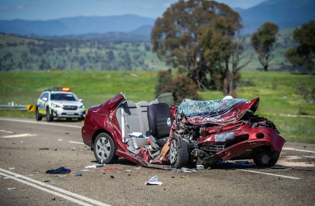 The wreckage of a vehicle after a head-on crash on William Hovell Drive. Picture: Karleen Minney