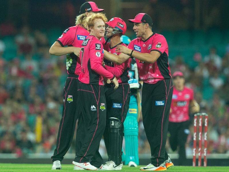 Lloyd Pope took his first BBL wicket for the Sydney Sixers against the Brisbane Heat on Sunday.