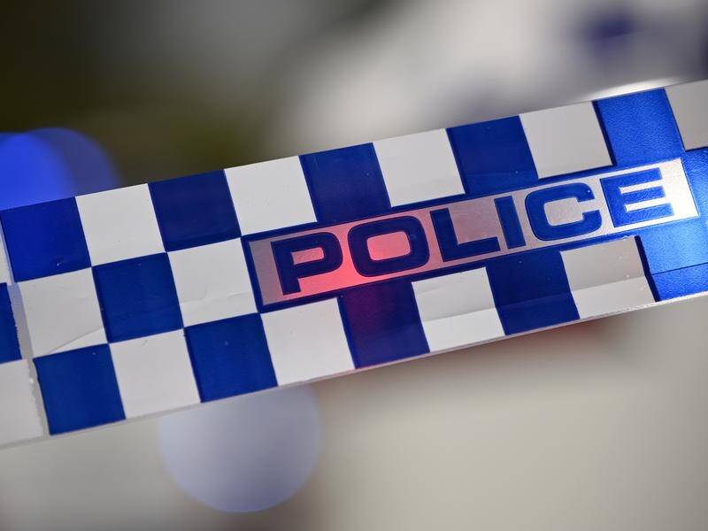 Thirty-seven break-ins have been linked to two men and three boys on the Gold Coast, police say. (Joel Carrett/AAP PHOTOS)