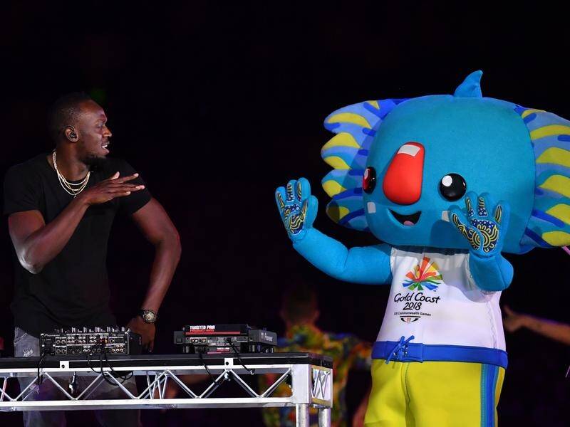 Borobi parties with Usain Bolt during the closing ceremony of the Gold Coast Commonwealth Games.